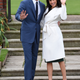 Britain's Prince Harry poses with Meghan Markle in the Sunken Garden of Kensington Palace, London, Britain, November 27, 2017. REUTERS/Eddie Mulholland/Pool - RC1F0054E660